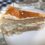 Keto cheesecake with almond crust and grated coconut.